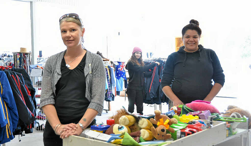 HELPING HANDS: Manager Stacey Friend runs her business with heart with the help of volunteers Lacey Rasmussen and Jacinta Dennison.